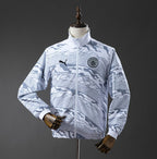 Chaqueta impermeable reversible Manchester City 2025/26
