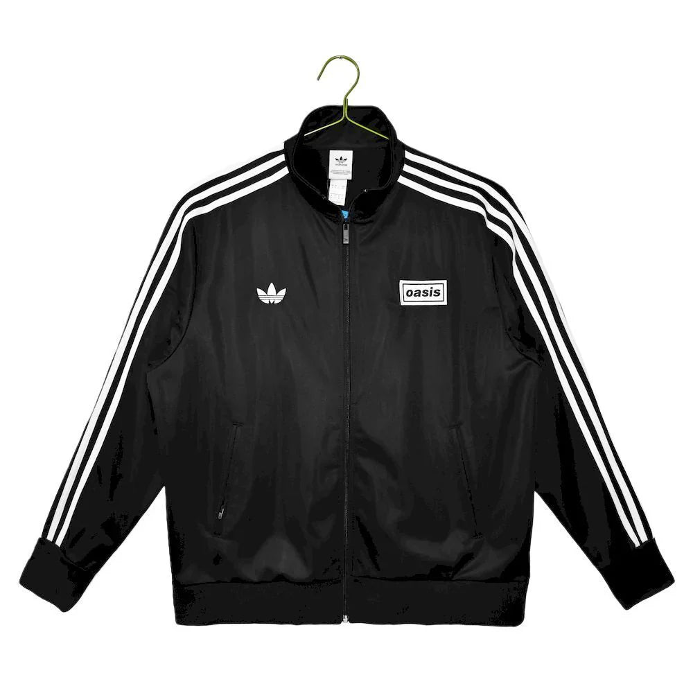 Abrigo Oasis x Adidas 2025